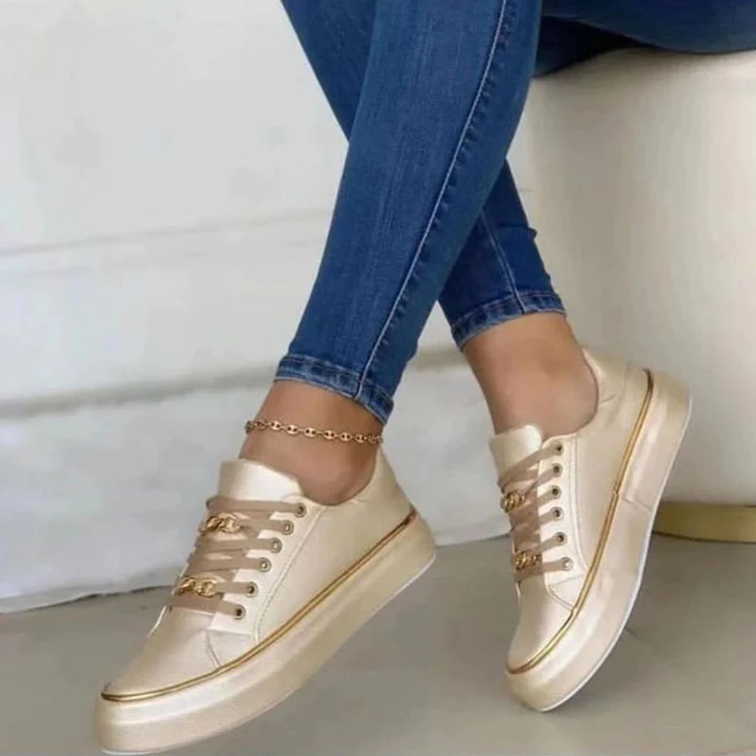 Chic Women's White Sneakers with Elegant Gold Highlights